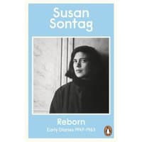 "Light blue book cover, 'Reborn' by Susan Sontag, features black-and-white portrait of a woman in a dark coat."