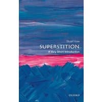 Book titled "Superstition" by Stuart Vyse, cover with abstract blue and pink brushstrokes, Oxford logo at bottom.