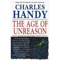 "The Age Of Unreason" book by Charles Handy, white cover with blue and red text, features a green frog illustration.