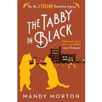 Book cover for "The Tabby in Black" by Duckworth Books, features two cats with a cityscape background.