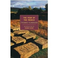 "The Year of the French" book with stone slabs on grassy field and distant hills on cover.