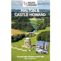 Guidebook "Walks Around Malton & Castle Howard" with scenic cover of countryside and historic buildings.