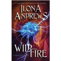 "Wildfire" book by Ilona Andrews, features blue flower with lightning on a dark mystical background.