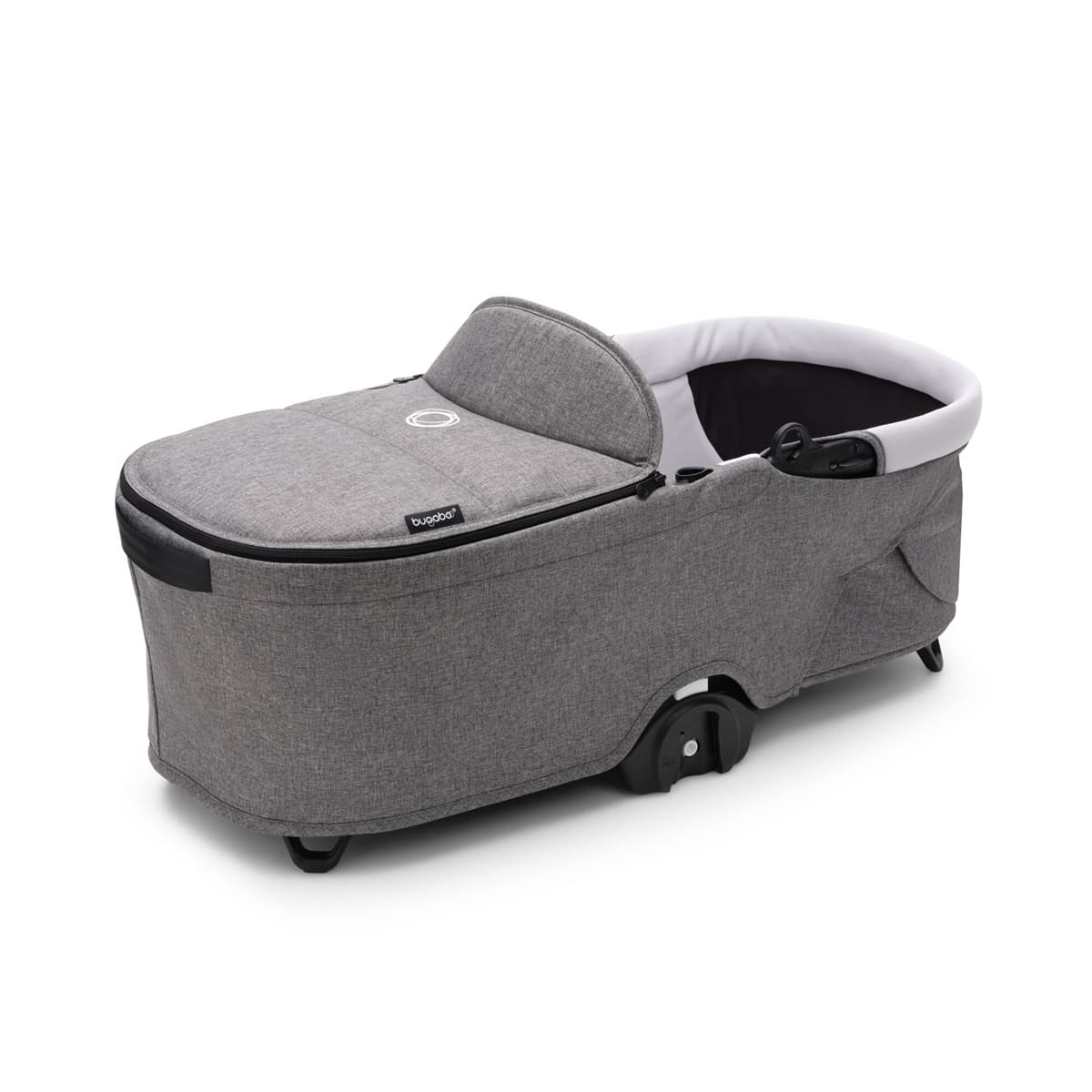 Gray fabric carrycot with a soft, padded interior, featuring a removable canopy, adjustable harness, and wheels for easy mobility, designed for the Bugaboo Dragonfly stroller.