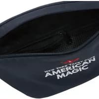 Navy blue Helly Hansen fanny pack with "American Magic" logo, zippered main compartment, and mesh inner pocket.