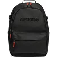 Black Superdry Utility Tarp women's backpack with embossed logo, front zip pocket, and orange zipper pulls.