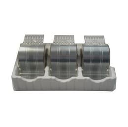 Three rolls of silver staples in a white plastic holder, labeled "Canon 1007B001/N1," designed for Canon IR 7086, each roll capable of stapling 5,000 pages.