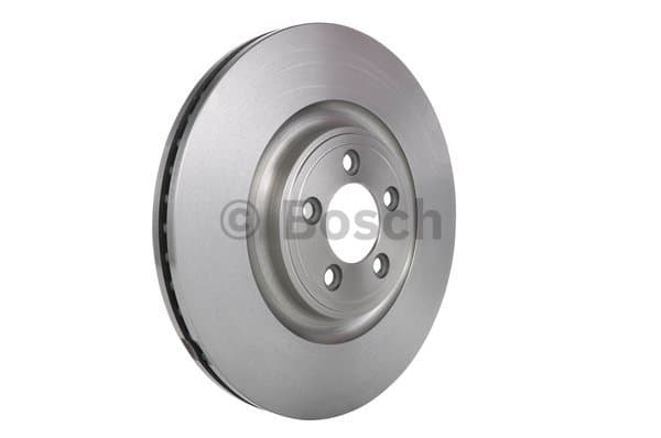 Vented brake disc featuring a silver metallic finish, circular shape, and multiple holes for mounting, designed for various Jaguar models by Bosch.