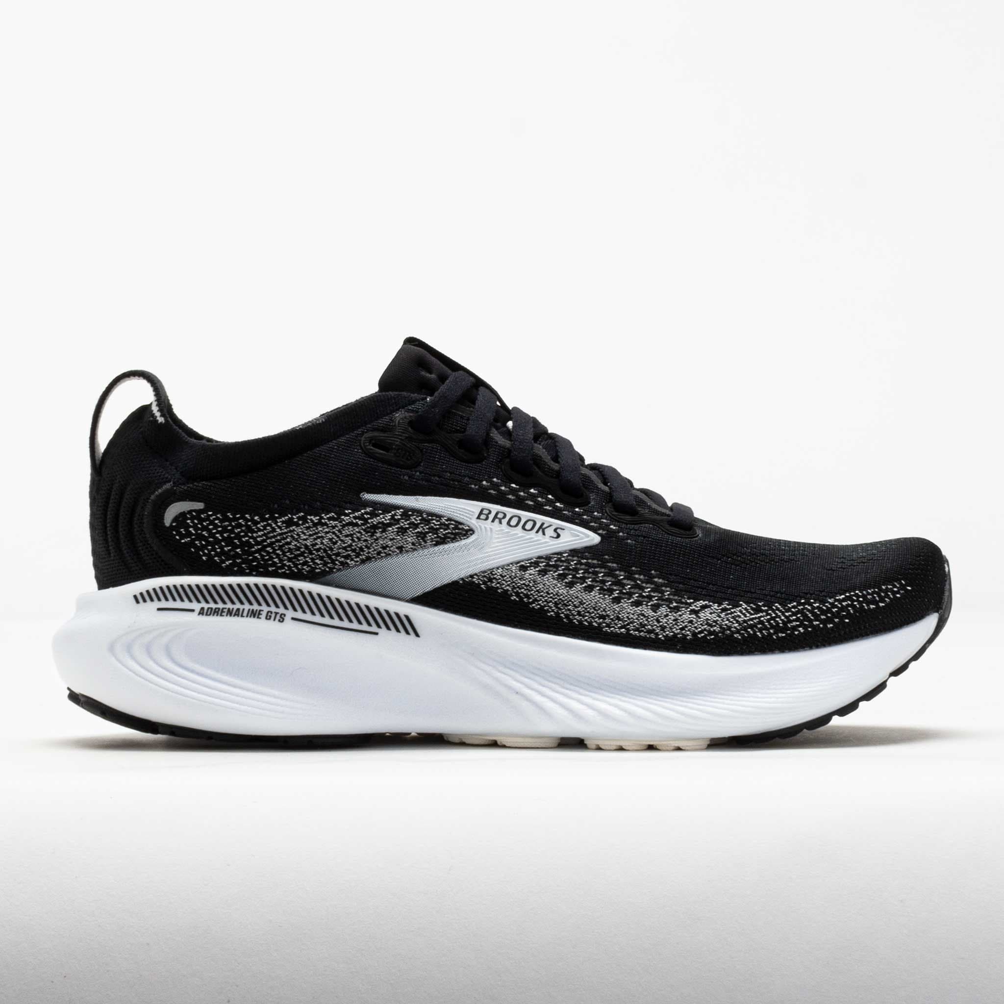 Black, grey, and white Brooks Adrenaline GTS 25 women's running shoes, featuring a textile upper, cushioned sole, and sleek design, size 8.5 B - Medium.