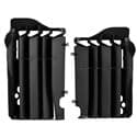 Black Polisport radiator louvres designed for KTM and Husqvarna models, featuring a durable plastic construction with multiple vertical slits for airflow and heat dissipation.