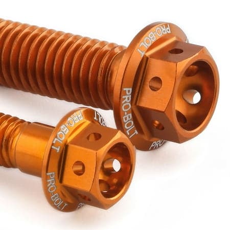 Pro-Bolt Aluminium Rear Brake Line Clip Mount Bolt Kit in vibrant orange, featuring hexagonal heads and engraved branding, designed for durability and performance.