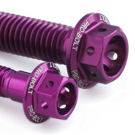 Purple anodized aluminum rear brake reservoir and master cylinder bolts with hexagonal heads, featuring engraved "PRO-BOLT" branding.