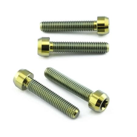 Pro-Bolt Titanium Front Brake Caliper Pinch Bolt Kit in gold, featuring four bolts with a shiny finish, hexagonal heads, and threaded shafts for secure fastening.