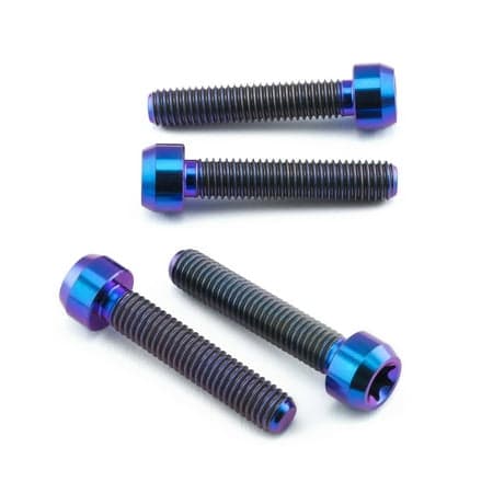 Purple titanium front brake caliper pinch bolt kit featuring four bolts with a shiny finish, combining purple heads and black threaded shafts for enhanced durability and style.