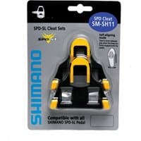 Black and yellow Shimano SH11 SPD-SL cleats with 6-degree float in retail packaging.