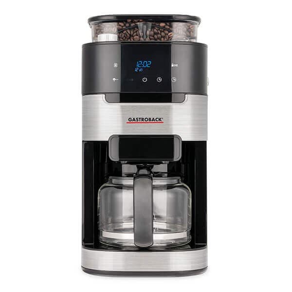 Silver Gastroback Coffee Machine Grind & Brew Pro featuring a digital display, a transparent bean hopper on top, and a glass carafe with a black handle.