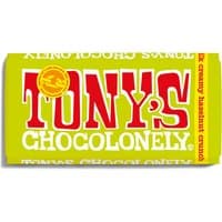 Green wrapper of Tony's Chocolonely Milk Chocolate Hazelnut Crunch with bold red and white text.