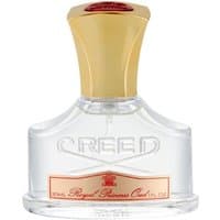 Clear glass bottle of Creed Royal Princess Oud perfume with gold cap and red label, 30 ml size.