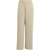 Beige loose women's joggers by Adidas, featuring an elastic waistband and wide-leg design.
