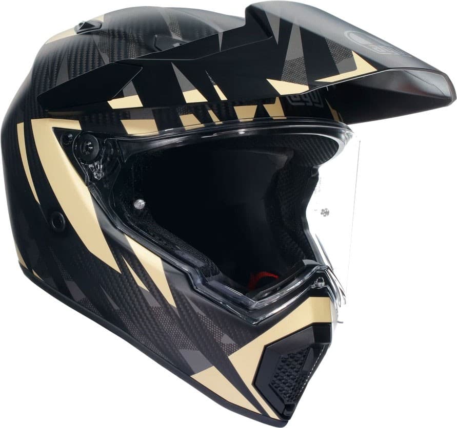 AGV AX9 Carbon Steppa S25 adventure helmet in matte dark grey, grey, and beige, featuring a sleek design, visor, and carbon fiber material, size M.