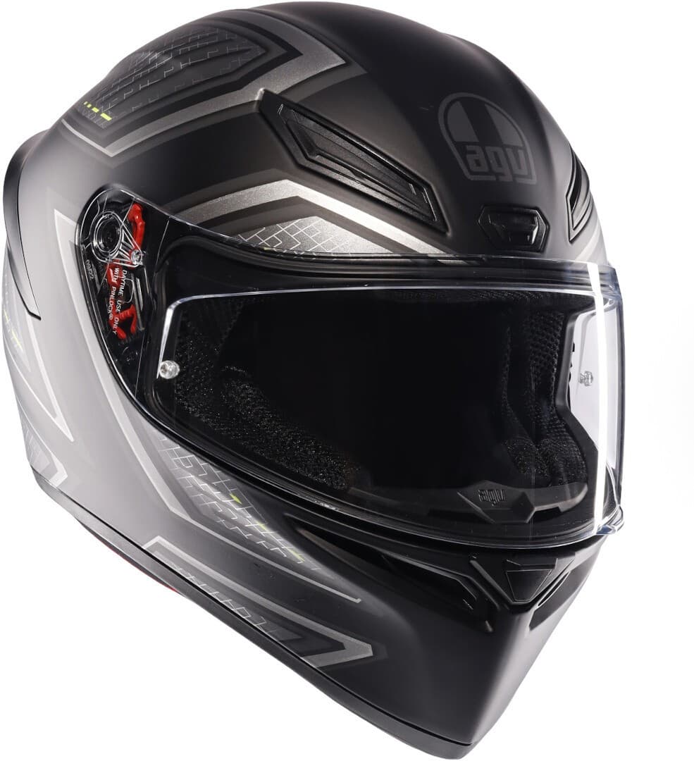 Black-grey AGV K1-S Sling Helmet in size XS for men, featuring a sleek aerodynamic design, tinted visor, and distinctive logo on the front.