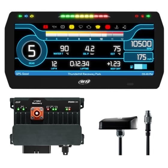 Advanced power distribution module and data logger kit featuring a 10-inch color display with street icons, GPS cable, and a robust black casing with a prominent battery connection.