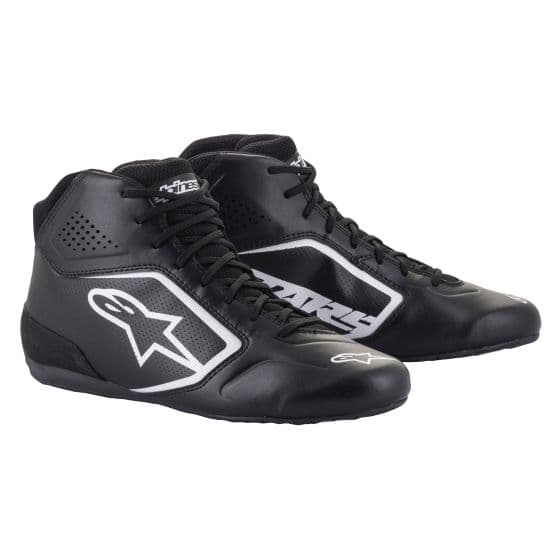 White and black Alpinestars Tech 1-K Start V2 kart boots featuring a sleek design, breathable mesh panels, and a rubber sole, available in UK size 10.5 / EUR 45.
