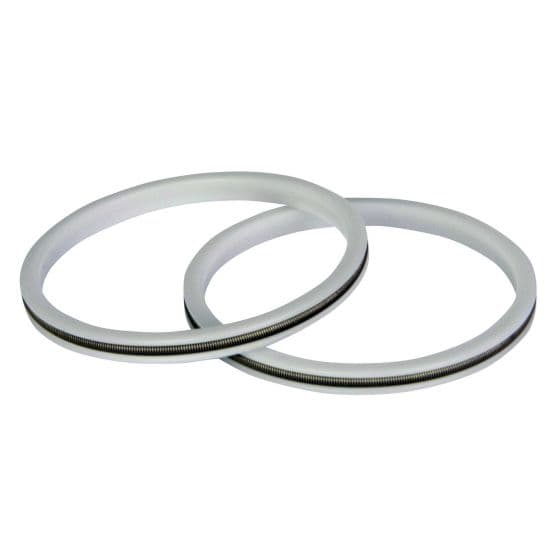 Two translucent white (48 MM) fork compression markers with a silver metallic band running around the center, designed for use with bicycles.