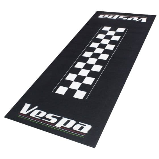 Black carpet featuring a checkered pattern and "Vespa" branding in white, designed for environmental sustainability, with a sleek, modern look suitable for bike enthusiasts.