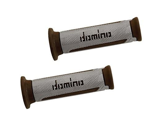 Gray rubber touring grips with textured surface and brown end caps, featuring the "Domino" logo prominently displayed on the side.
