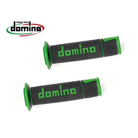 Black and green MX offroad twist throttle grips featuring a textured surface, rubber material, and prominent "Domino" branding in green on the side.