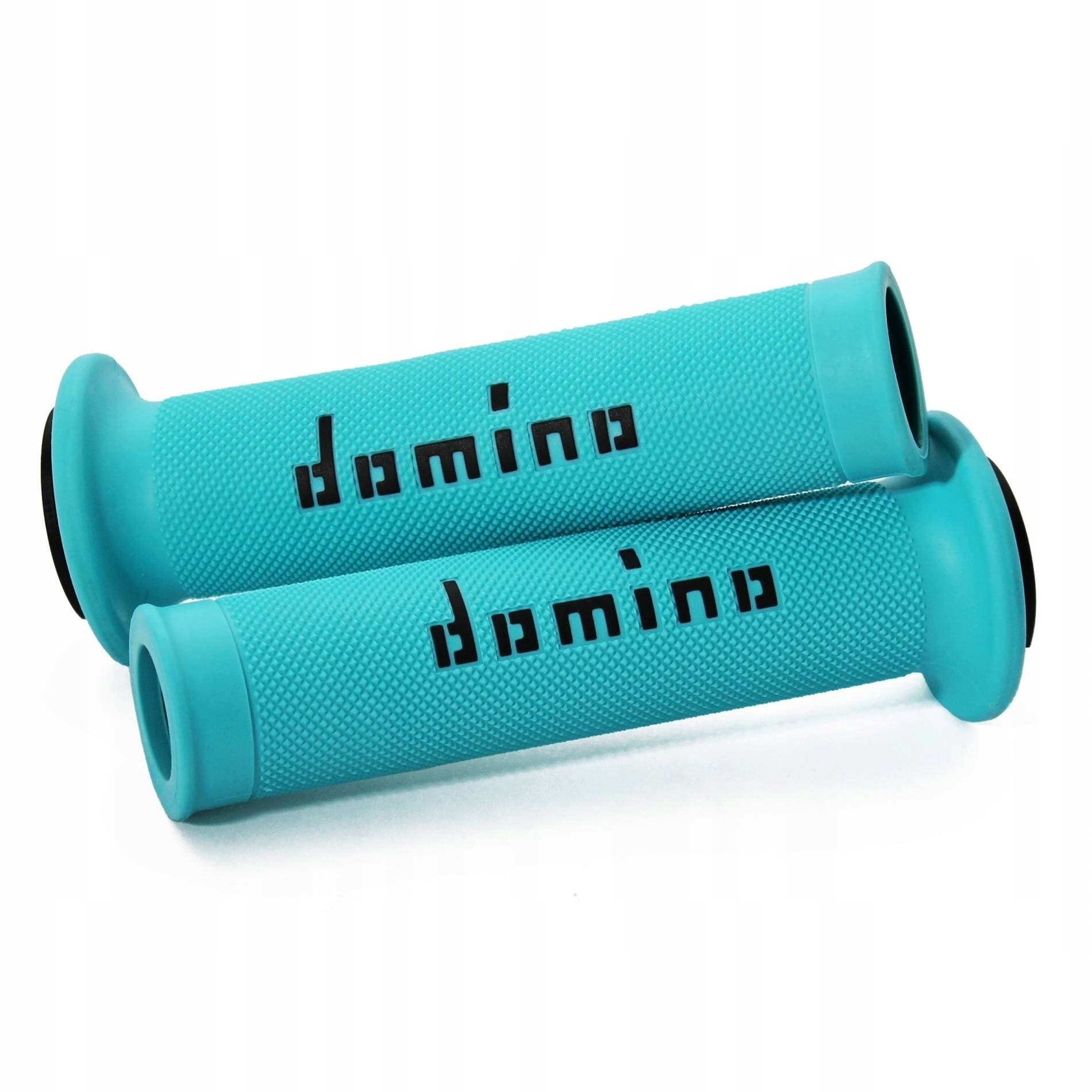 Turquoise soft rubber grips with textured surface and black "domino" logo, designed for enhanced grip and comfort on handlebars.