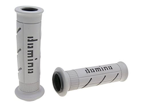 Gray and black rubber handlebar grips featuring a textured surface for improved grip, with "Domino" branding prominently displayed on the side.