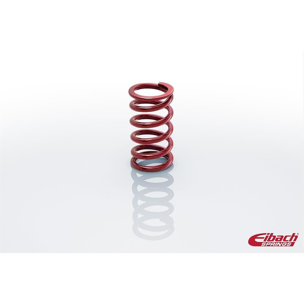 Red coil spring with seven tightly wound coils, measuring 7 x 2.25 inches, designed for heavy-duty use, featuring Eibach branding at the bottom right.