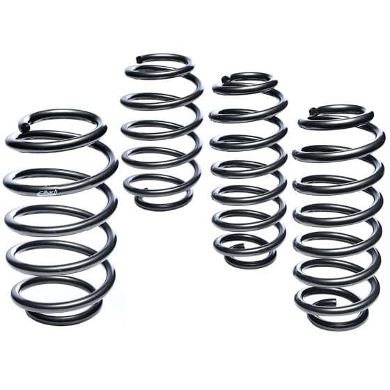 Black coil springs from the Eibach Pro-Kit suspension kit, featuring a sleek, smooth finish and varying heights, designed for enhanced vehicle performance.
