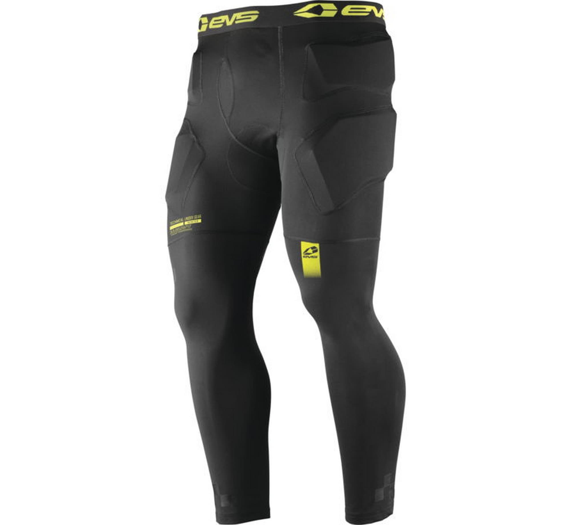 Black padded winter pants with 3/4 length, featuring protective foam panels, a snug fit, and a vibrant yellow EVS logo on the thigh, designed for impact protection.