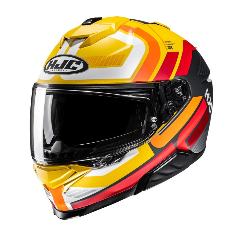 Full face motorcycle helmet in vibrant yellow with red and orange accents, featuring a clear visor, aerodynamic design, and HJC branding.