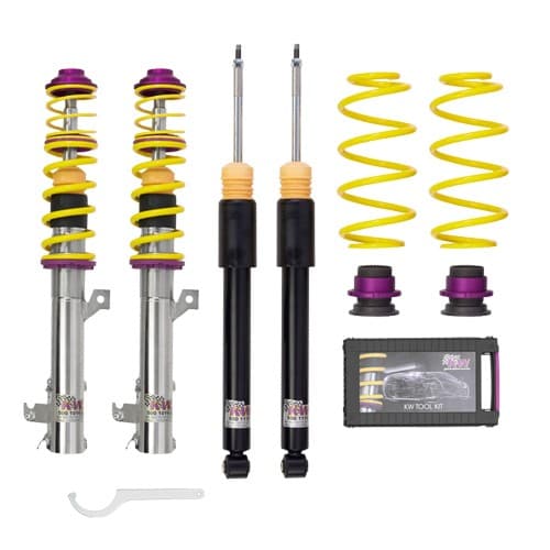 KW Suspension V1 Coilover Kit featuring stainless steel shock bodies, yellow and purple springs, adjustable dampers, and a tool kit for installation.