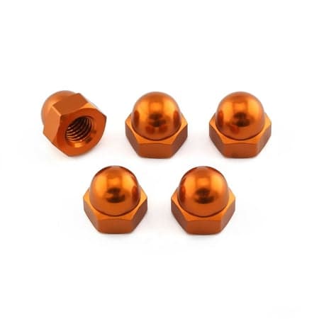 Five orange alloy dome nuts with a shiny finish, featuring a hexagonal shape and M10 x 1.50mm threading, arranged with one nut slightly separated from the others.