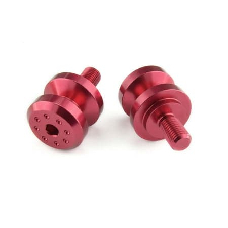 Red anodized aluminum paddock stand bobbins with a 10mm thread, featuring a circular base with multiple holes for secure attachment.