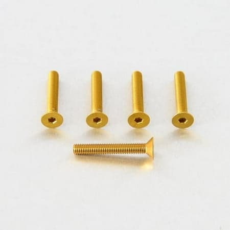 Five gold countersunk alloy bolts, M5 x 0.80mm x 31.0mm, featuring hexagonal heads and a sleek finish, arranged with one bolt lying horizontally and four standing vertically.