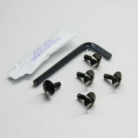 Pro-Bolt Stainless Steel Exhaust Heat Shield Mount Bolt Kit in black, featuring five black bolts with flanged heads, an Allen wrench, and a small packet of adhesive.