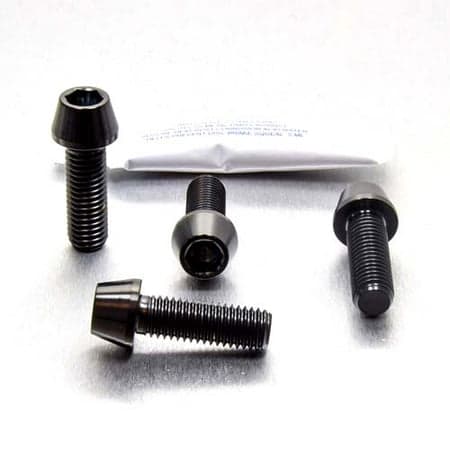 Pro-Bolt Titanium Rider & Pillion Footrest Hanger Bolt Kit in black, featuring four sleek, durable titanium bolts with a shiny finish and hexagonal heads for easy installation.