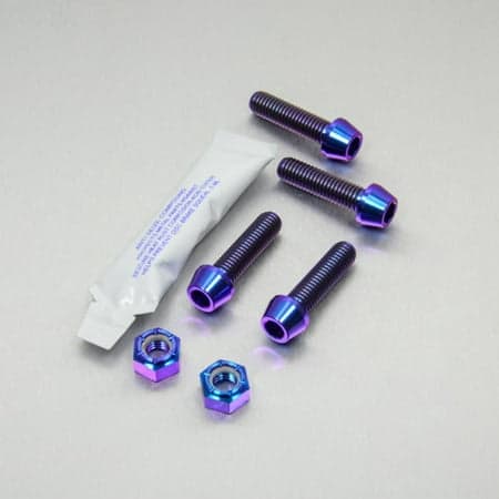 Pro-Bolt Titanium Rider Footrest Hanger Bolt Kit in purple, featuring four titanium bolts, two hex nuts, and a small packet of thread lock, all with a shiny finish.