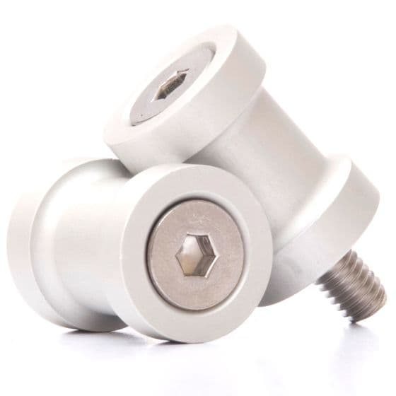 Silver M6 paddock stand bobbins with a smooth, metallic finish, featuring a hexagonal socket for easy installation and a threaded screw for secure attachment.