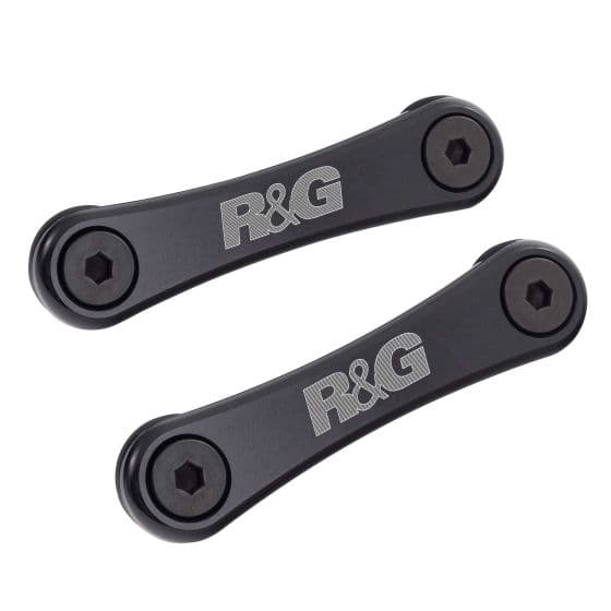 Black aluminum rear footrest blanking plate kit by R&G, featuring two pieces with a sleek design and engraved logo, designed for motorcycle use.