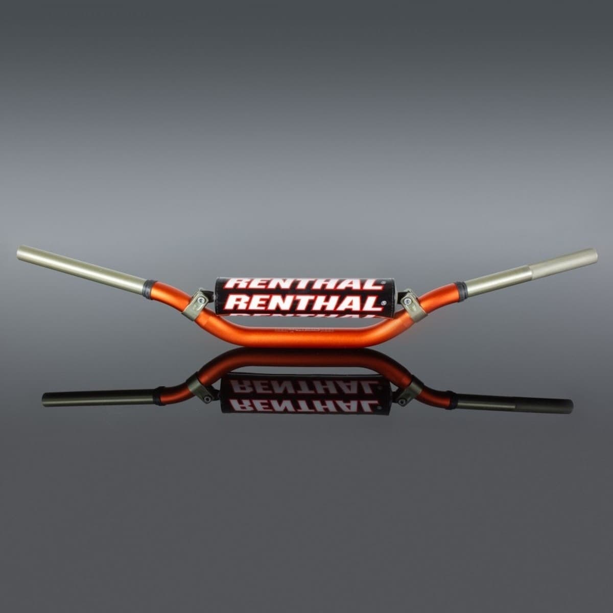 Renthal Volant MX Twinwall handlebar in orange and silver, featuring a sturdy aluminum construction with a wide grip area and the "RENTHAL" logo prominently displayed.