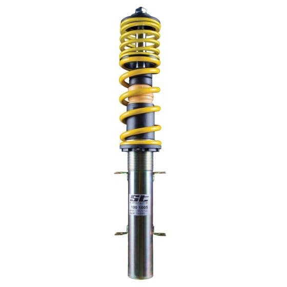 ST Suspension ST XA Coilover Kit features a metallic silver body, yellow coil spring, and adjustable height mechanism, designed to lower vehicles by 30-55mm for enhanced performance.