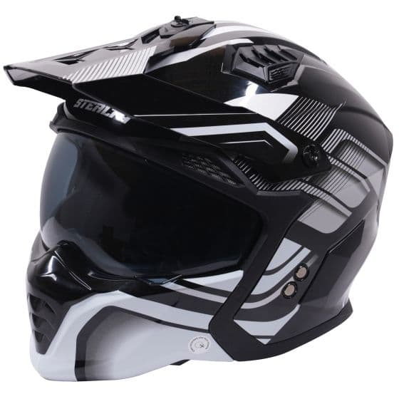 Convertible helmet in black with gloss silver graphics, featuring a sleek aerodynamic design, tinted visor, and adjustable ventilation. Size M.