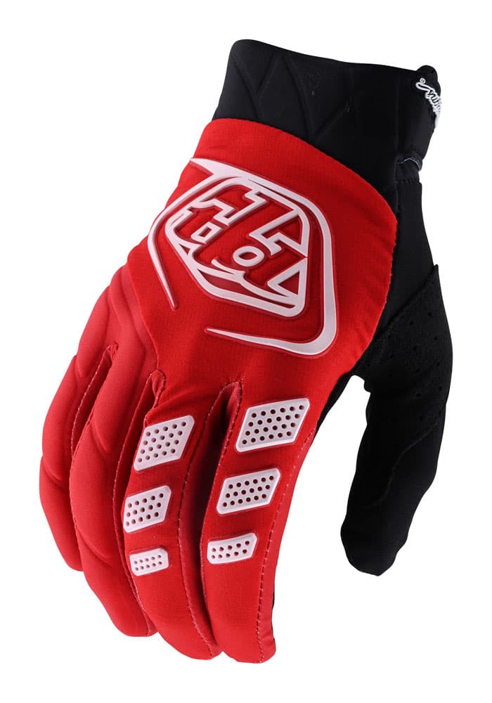 Red Troy Lee Designs Revox motocross gloves in 2X-Large, featuring padded fingers, ventilation holes, and a black mesh back for breathability and comfort.